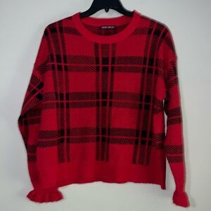 Women’s black and red plaid sweater with ruffle trim sleeve